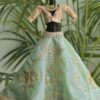 Green and gold embroidered bridal lehenga for Barbie doll