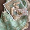 Green and gold embroidered bridal lehenga for Barbie doll