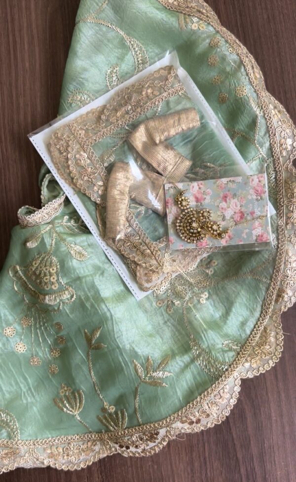 Green and gold embroidered bridal lehenga for Barbie doll