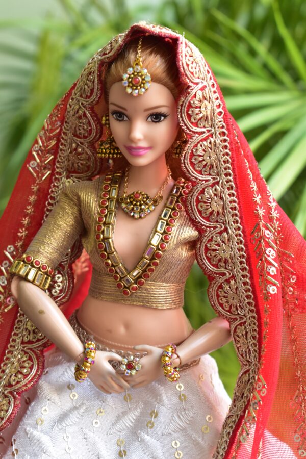 White and red Gujarati bridal lehenga for curvy Barbie doll