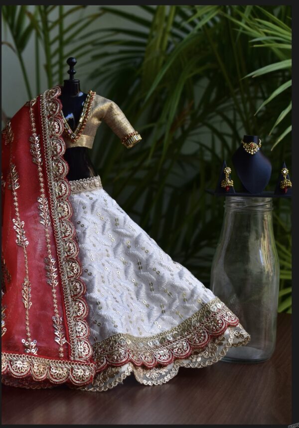 White and red Gujarati bridal lehenga for curvy Barbie doll