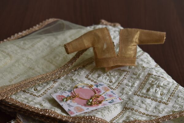 Embroidered pastel green lehenga for doll