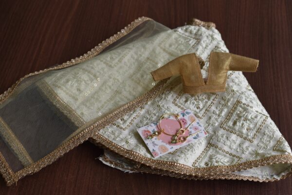 Embroidered pastel green lehenga for doll