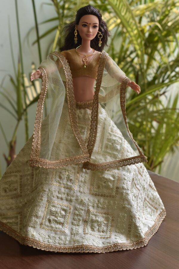 Embroidered pastel green lehenga for doll