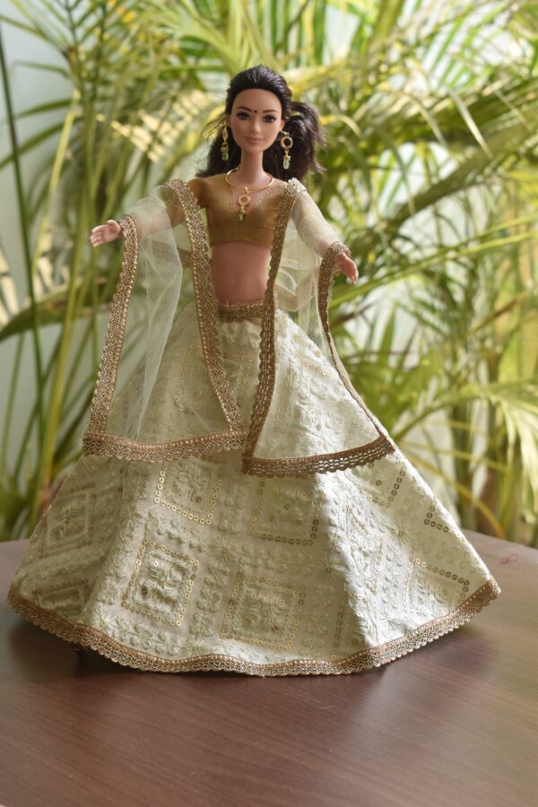 Embroidered pastel green lehenga for doll