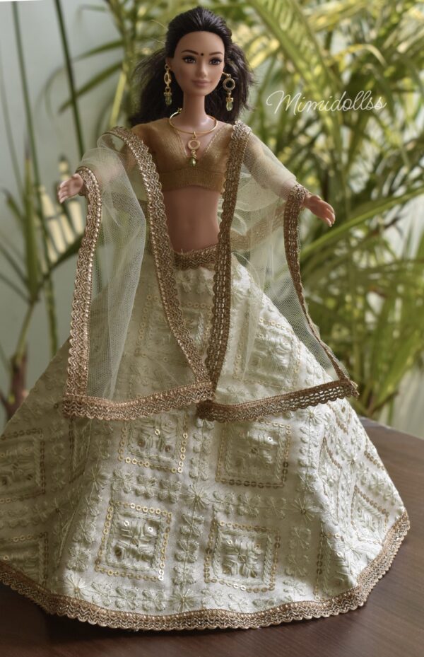 Embroidered pastel green lehenga for doll