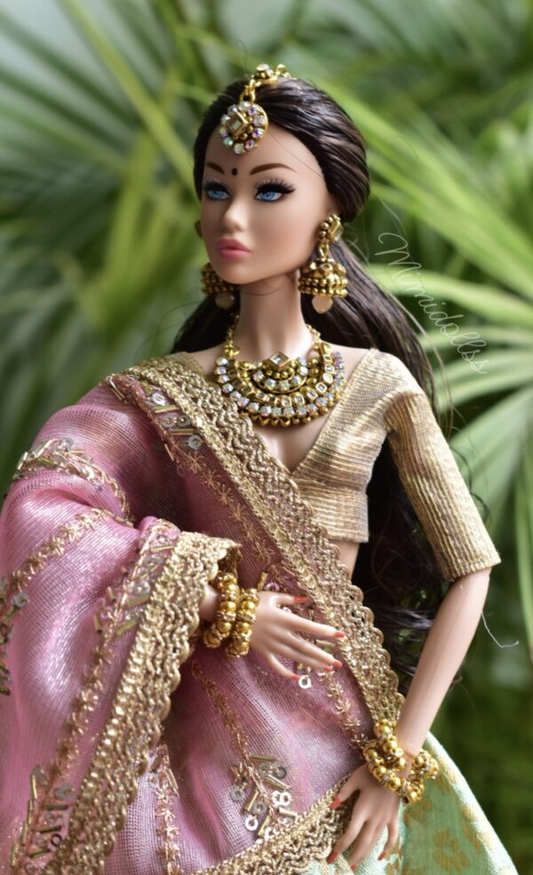 Aishwarya doll (pink and green bridal costume)