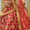 Red bridal lehenga with accessories for doll
