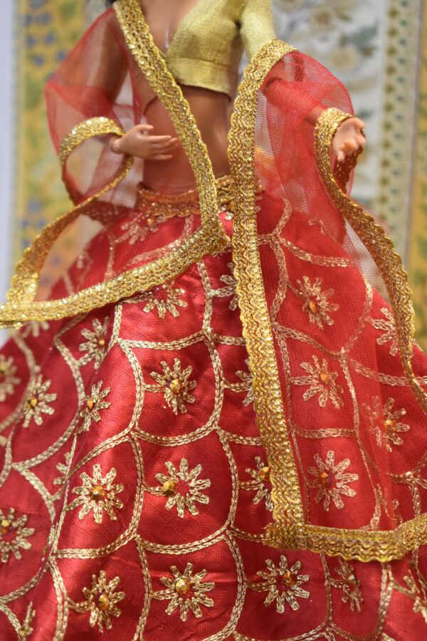 Red bridal lehenga with accessories for doll
