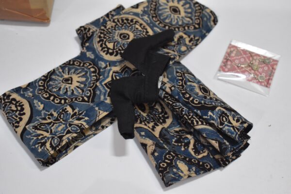 A set of 10 Indian block printed cotton sarees with accessories for doll