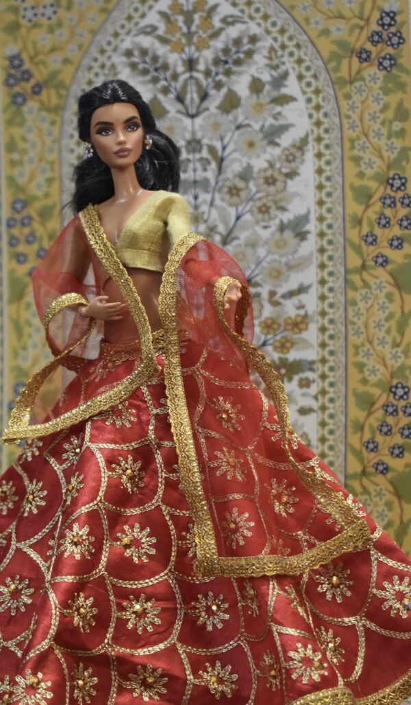 Red bridal lehenga with accessories for doll