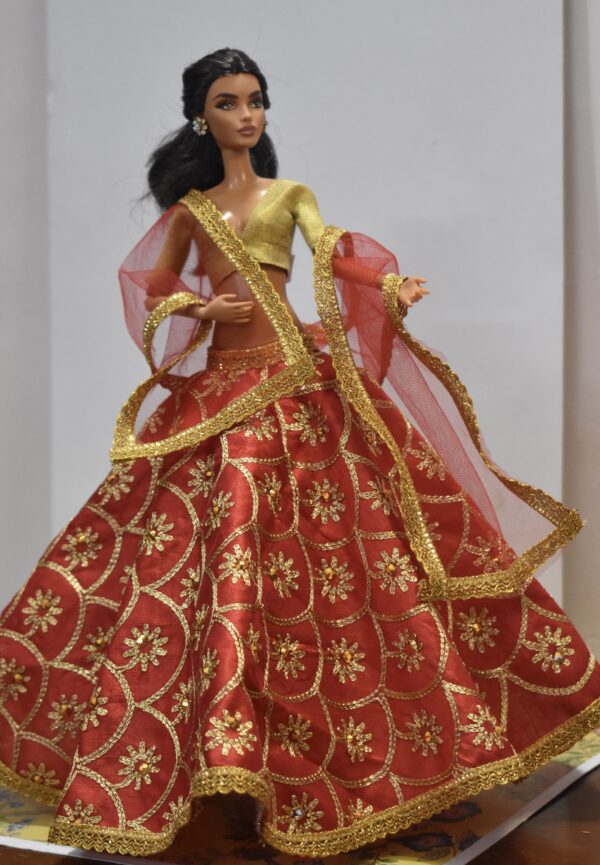Red bridal lehenga with accessories for doll