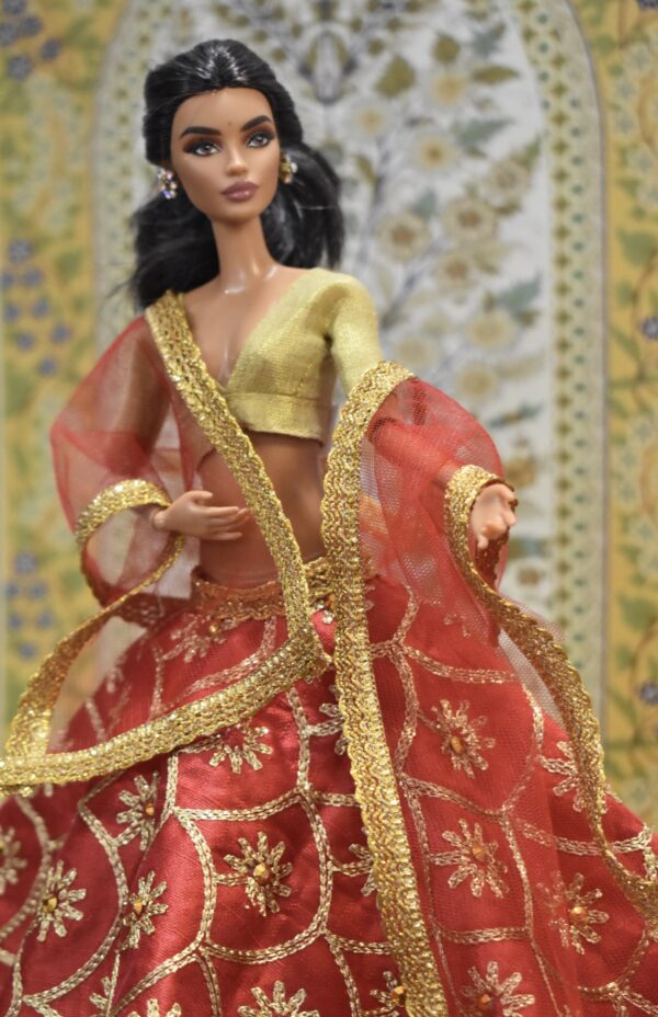 Red bridal lehenga with accessories for doll