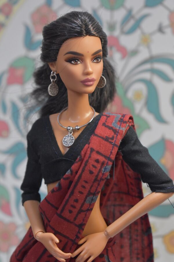 Maroon printed saree with accessories for doll