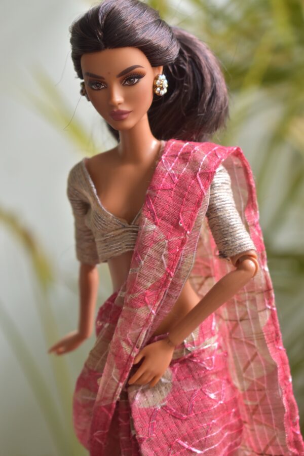 A set of 4 sarees for Barbie doll with jewellery