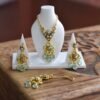 Gold and teal bridal jewelry for dolls