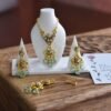 Gold and teal bridal jewelry for dolls