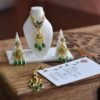 Gold and green bridal jewelry for dolls