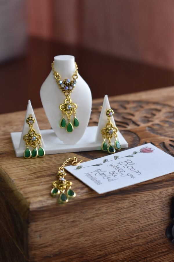 Gold and green bridal jewelry for dolls