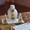 Gold and green bridal jewelry for dolls