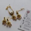 Gold and pink bridal jewelry for dolls