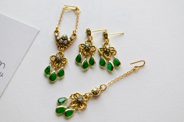 Gold and green bridal jewelry for dolls