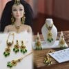 Gold and green bridal jewelry for dolls